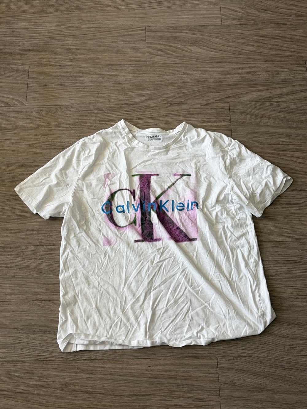 Calvin Klein White Tee with Pink, Purple & Blue Logo